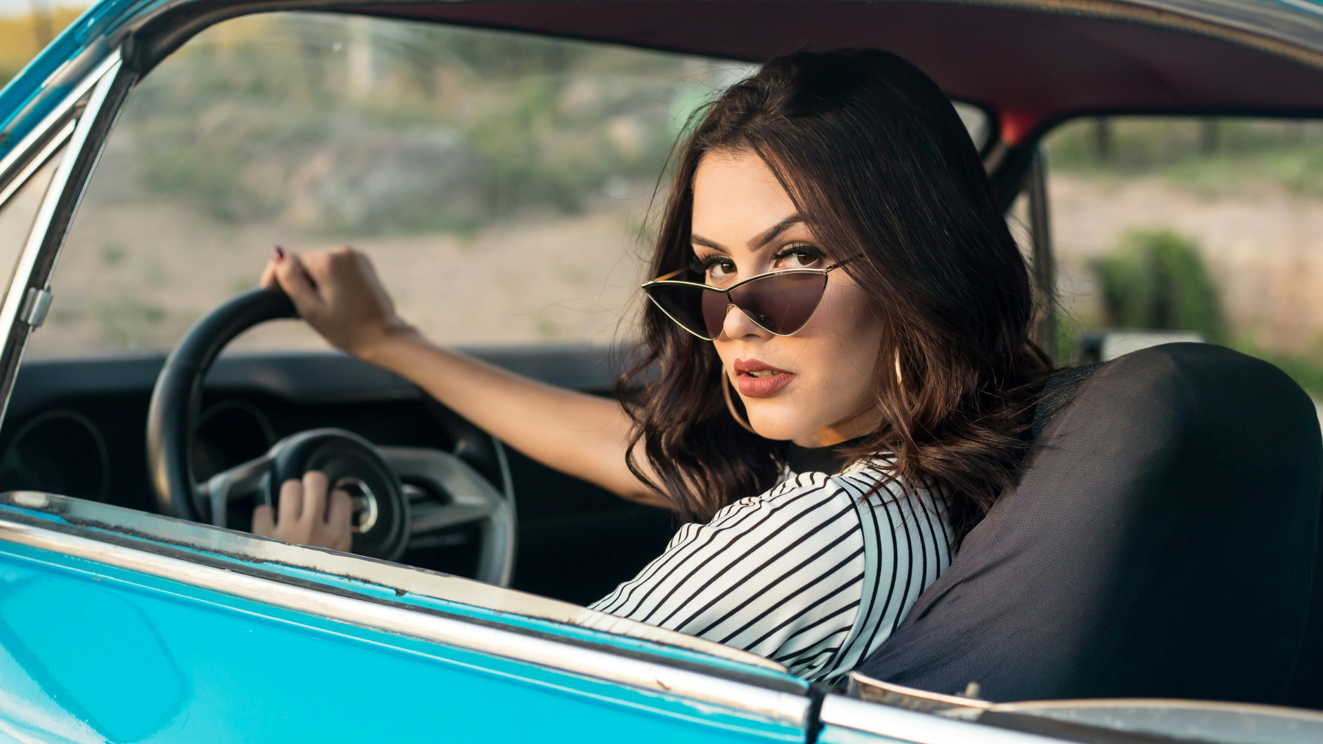 Frustrated driver realizing they’ve been overpaying for car insurance while comparing quotes online